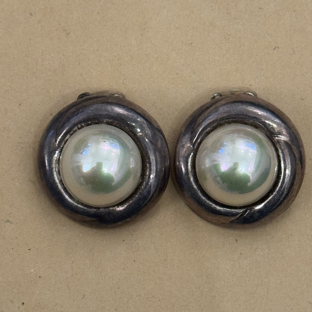 Sterling Silver tone pearl earrings. Clip on. Stamped and signed by Barra.